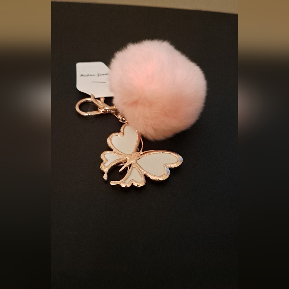 Butterfly charm with pink pom pom NWT